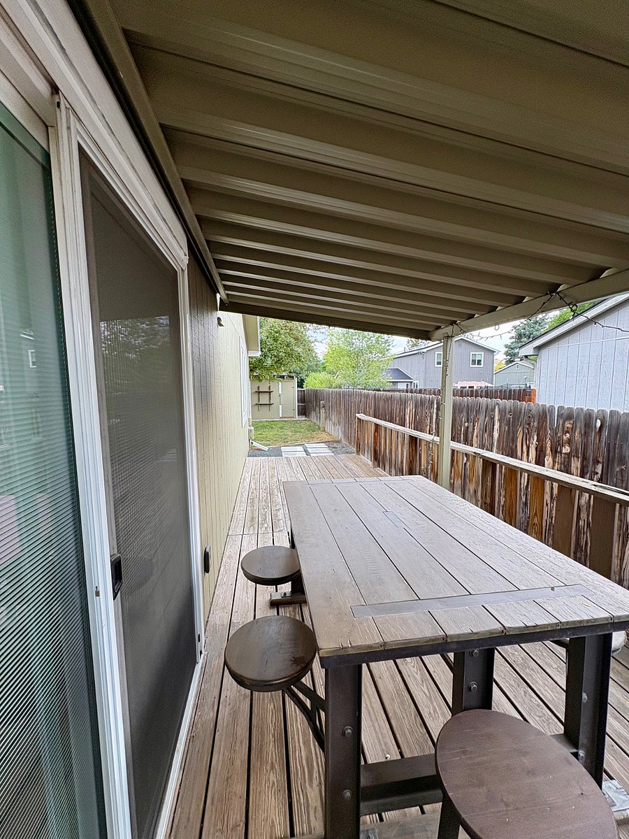 Covered Deck off of Kitchen with 6 Top Dining Table
