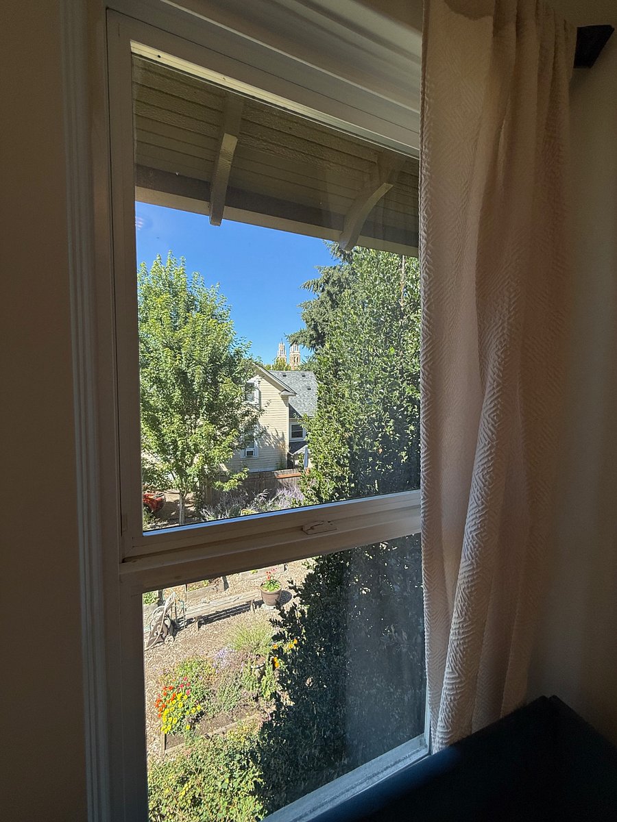 View from bedroom, overlooking garden and church steeples