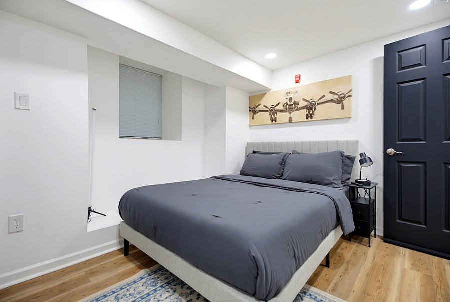 Comfortable queen-size bed in a private bedroom.