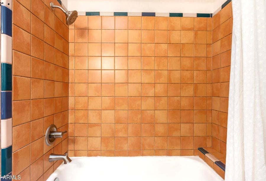 Second bathroom with tub and shower