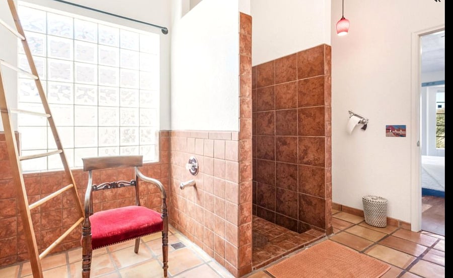 Primary bathroom with lots of natural light