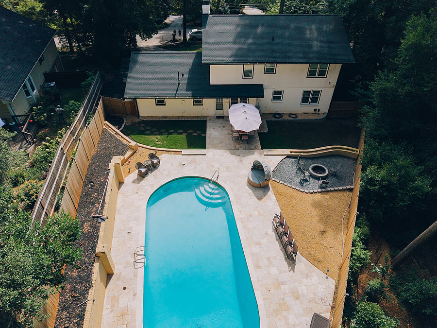 Pool, fire pit, outdoor dining, and grill