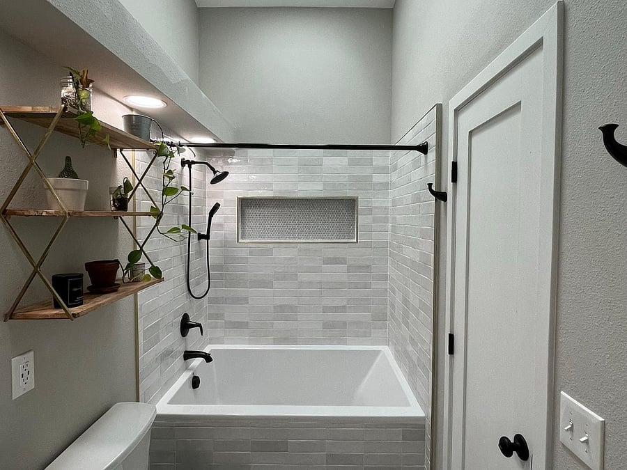 Primary bathroom with soaking tub and shower.