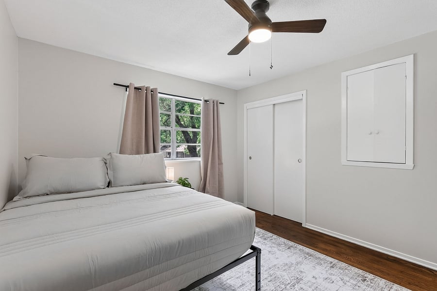 Bedroom 2- Comfortable queen size bed with hotel sheets and 4 pillows. 
