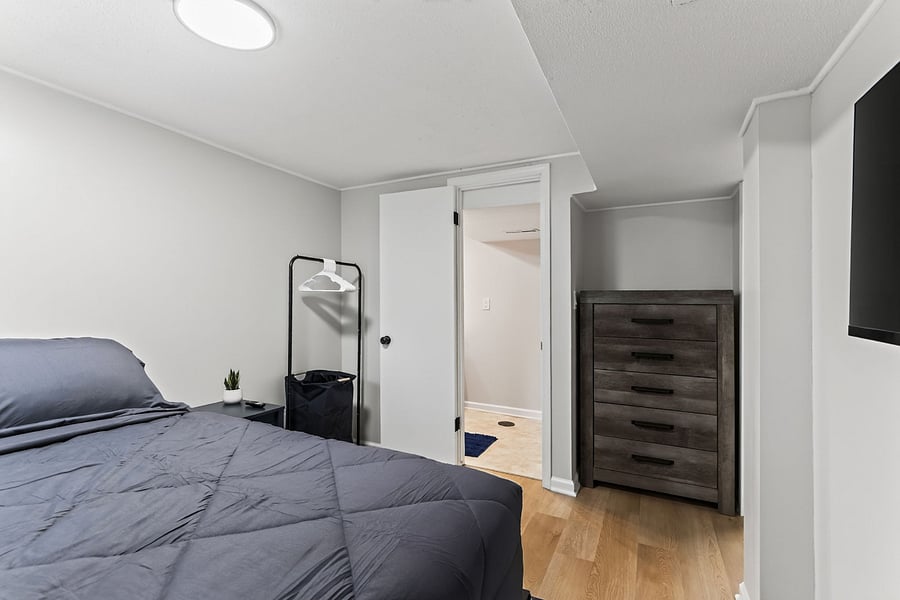 Bedroom 3- Comfortable queen size bed with hotel sheets and 4 pillows. 

