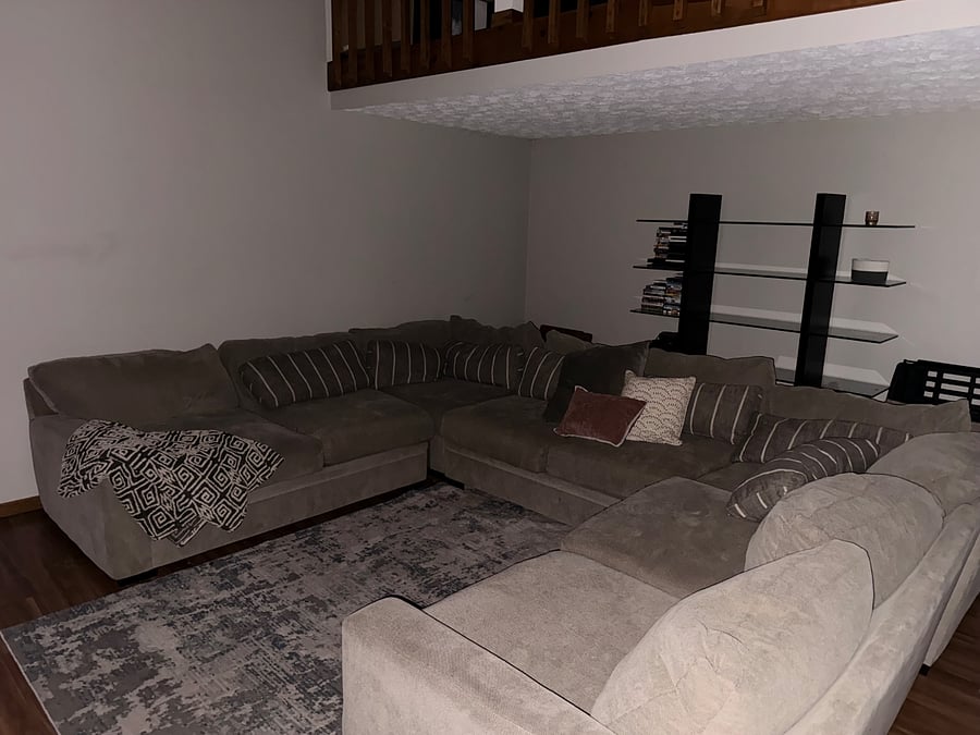     Spacious Family Room  Large, comfortable gathering space with ample seating and an open view to the upstairs loft.