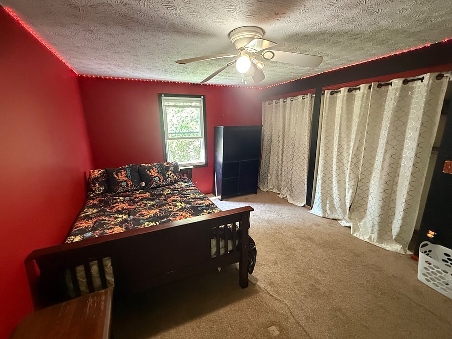     Spacious Bedroom  Comfortable furnished bedroom with generous floor space, natural light, storage, and room to settle in for an extended stay.