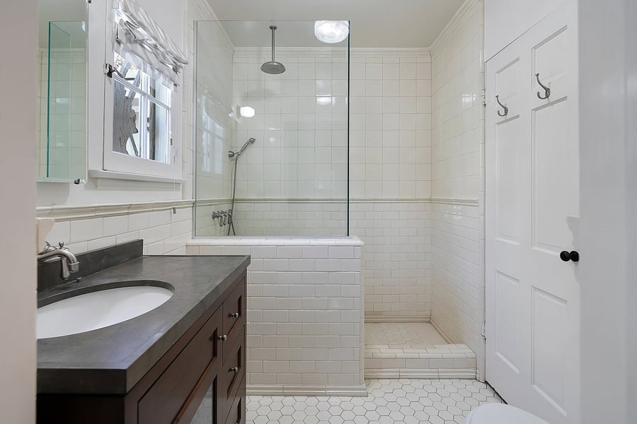 Bathroom for the second bedroom featuring walk-in shower.