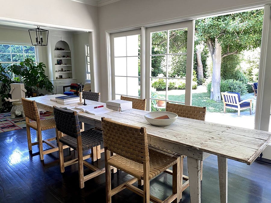 View of the dining room that leads to the backyard for a charming indoor-outdoor dining experience.