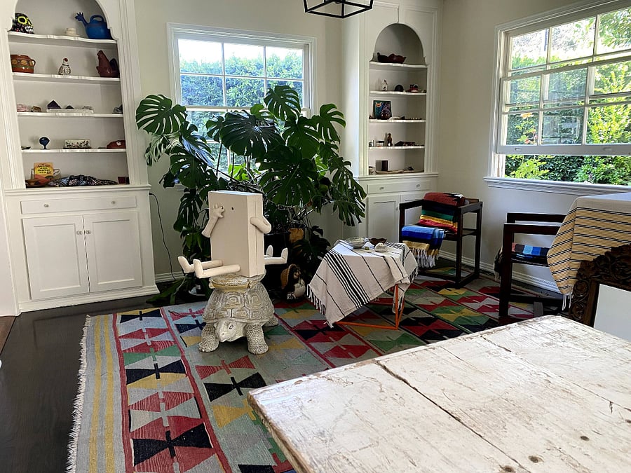 A view of the sitting area that is adjacent to both the dining room and kitchen.