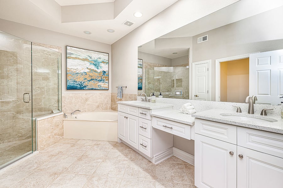 Remodeled primary bath with soaking tub and walk-in shower