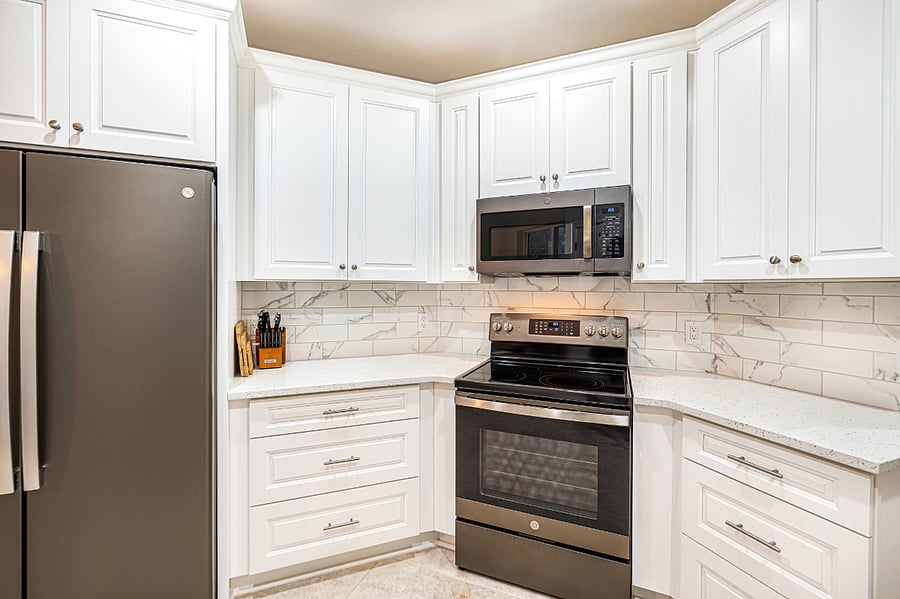 Remodeled kitchen with generous counter and storage space