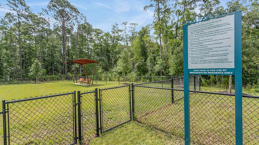 Community dog park, with waste bags provided in stations throughout the community