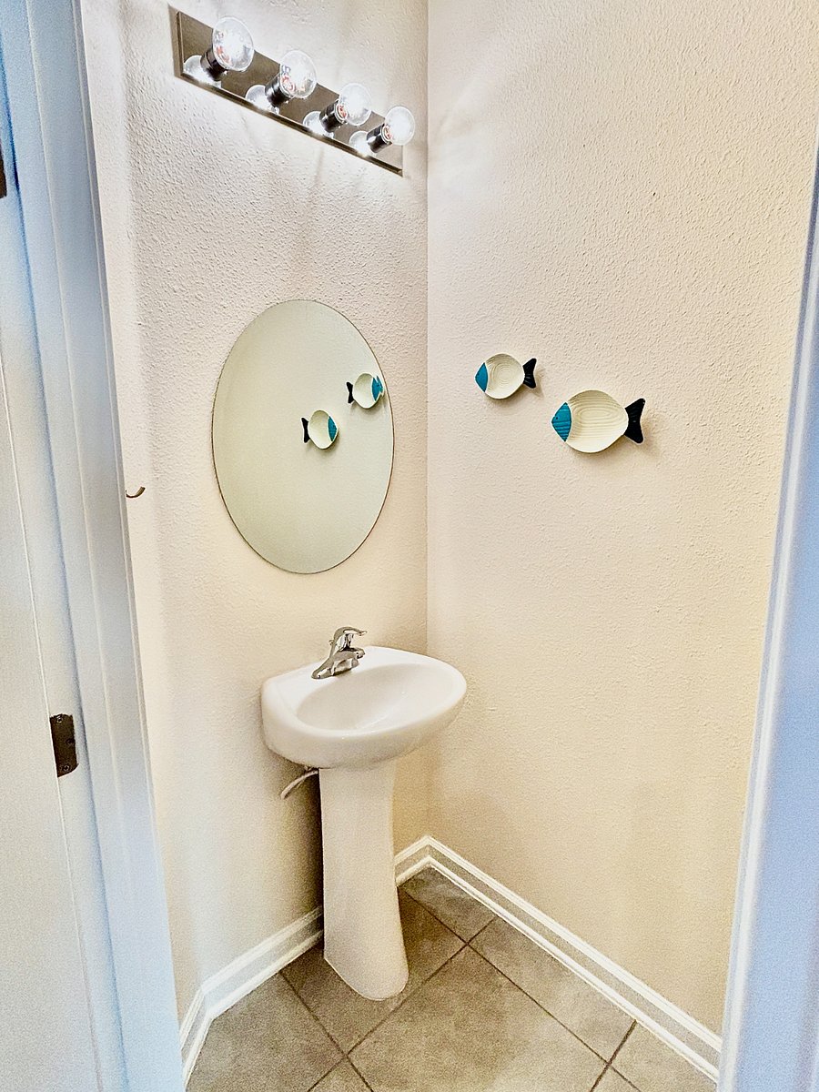 Half bathroom located downstairs