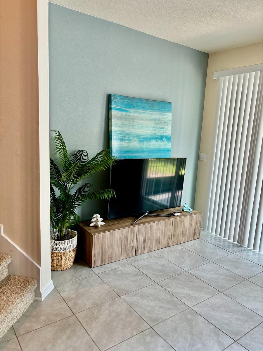 Downstairs living room, TV area, with console and smart TV