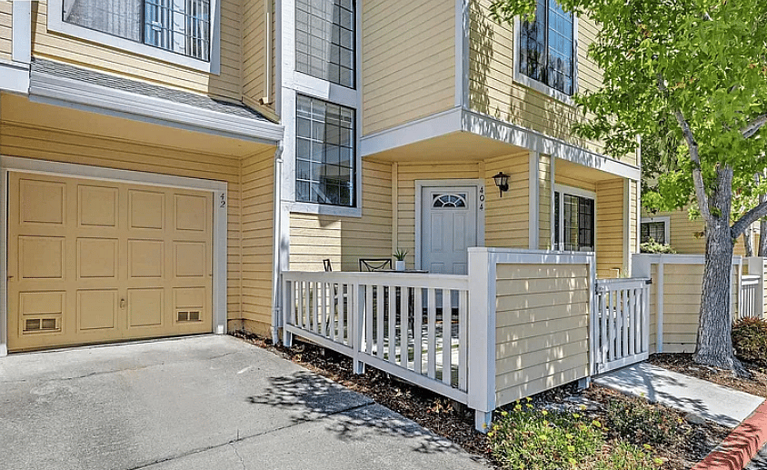 Private entrance, attached garage and fenced front patio