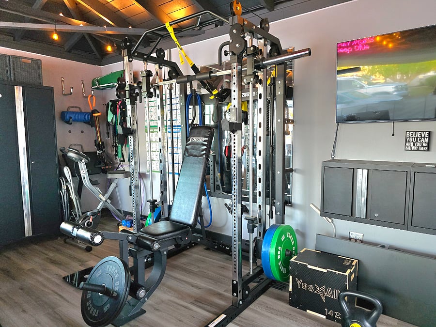 Access to home gym equipment and pool table located in the finished garage. 
