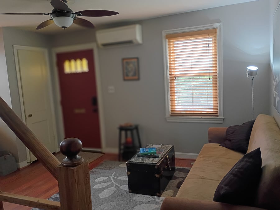 Entrance and front sitting room.