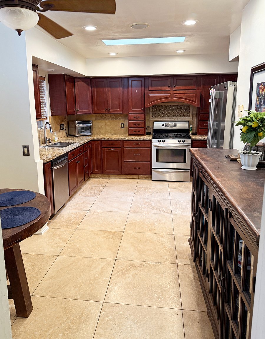 Shared and fully stocked kitchen.