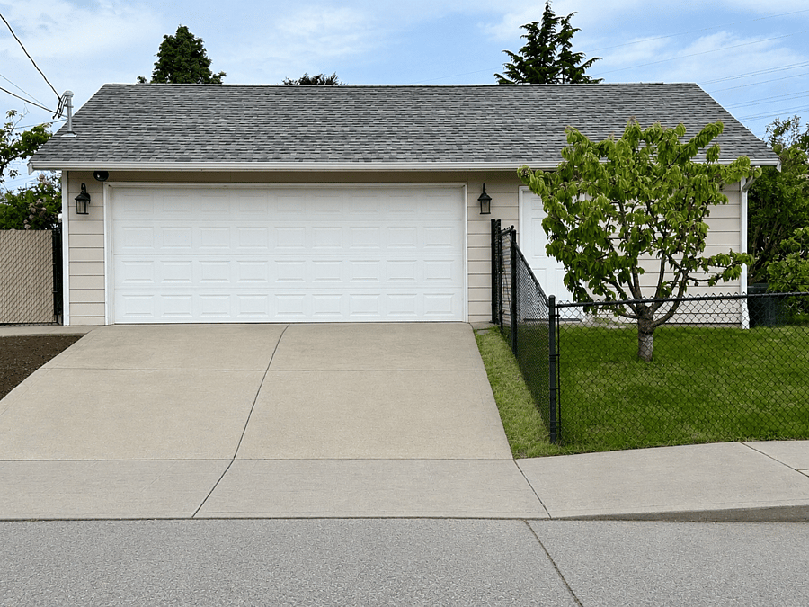 Exterior and 2-car garage, fenced yard