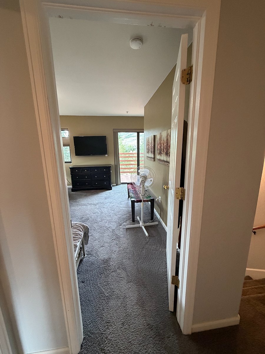 view from hallway into master b/r
