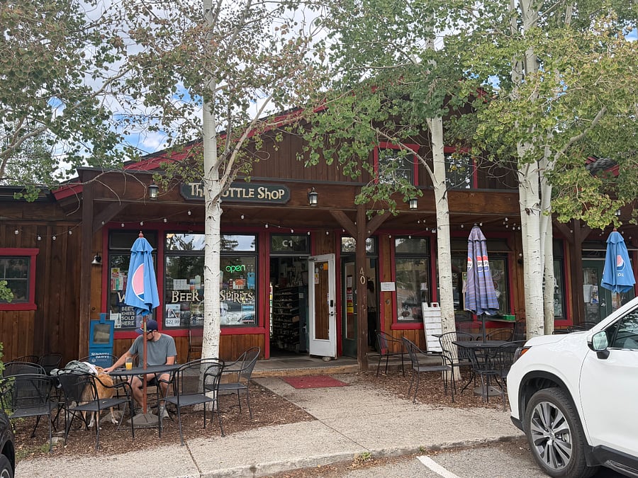 The Bottle Shop Liquor Store, next door to Cove Bike & Ski