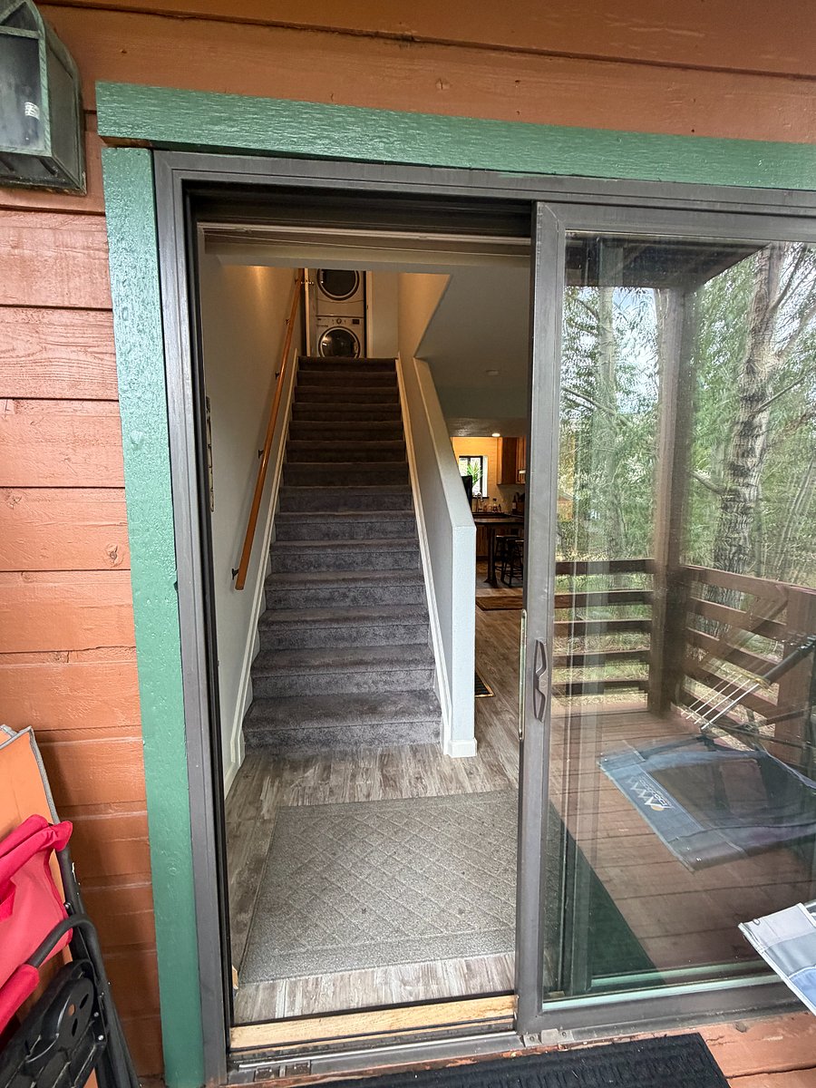 inside stairs view from downstairs deck