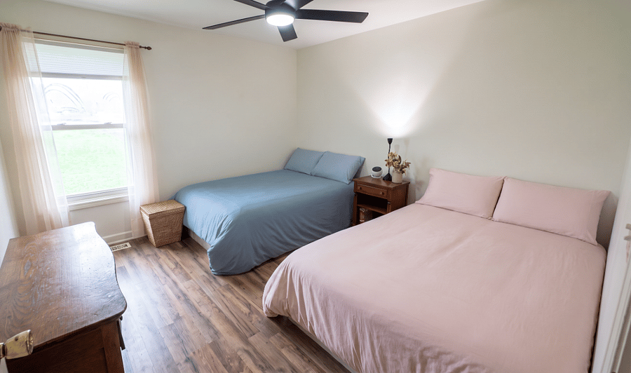 Two full size beds, dresser and built-in closet.