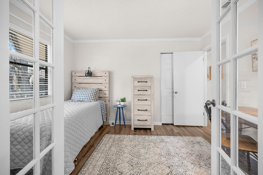 Third bedroom featuring French doors