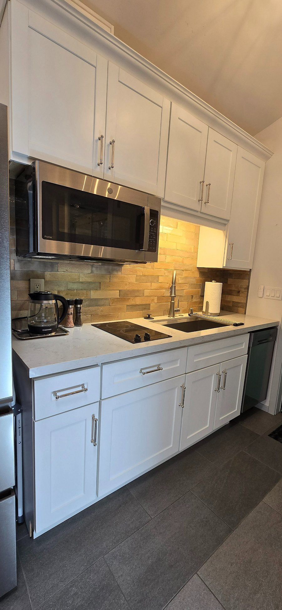 Lighted Kitchnette, Cooktop, Dishwasher, Hot Water Pot