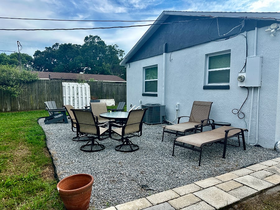 Outdoor Living Area Including Fire Pit and Dining Table
