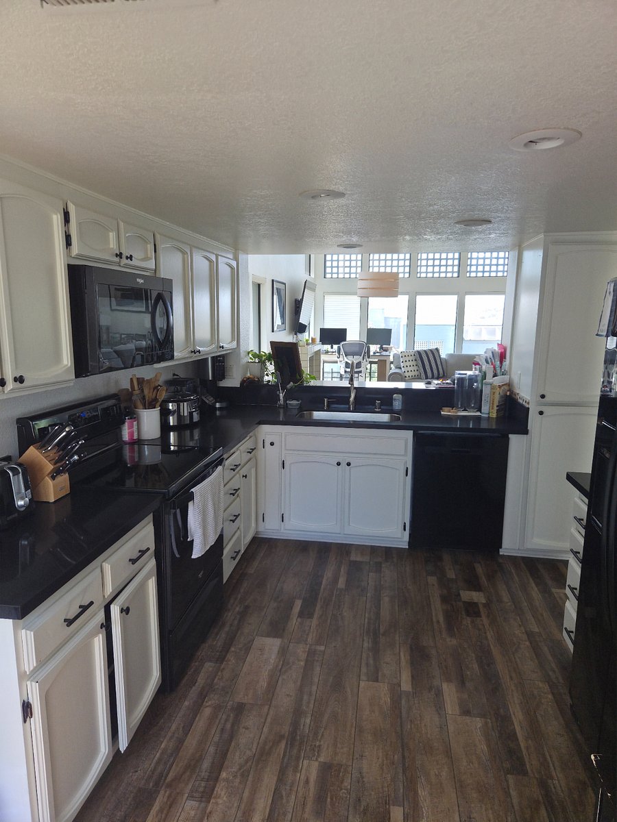 Full amenity kitchen, complete with all cooking essentials, utensils, and cleaning supplies.