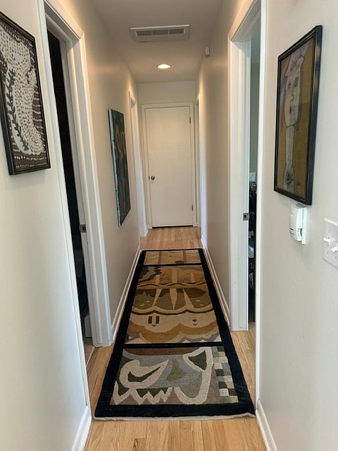 Hallway to 3 bedrooms and 2 baths