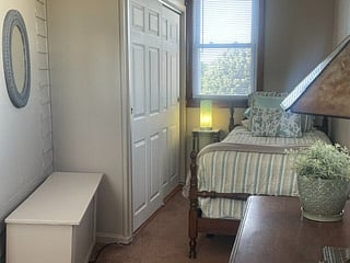BONUS ROOM
Natural light fills the room. Lots of windows with shades.
Twin Bed ~ Workspace ~
Large Double Closet ~Dresser