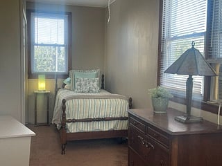BONUS ROOM
Nice size room with twin bed and plenty of storage
This room has a window air conditioner and ceiling fan.