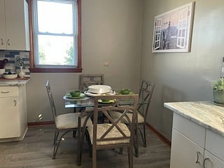 KITCHEN
Plenty of room to cook and eat in the dine in kitchen. Glass table with seating for 4.