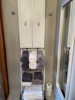 BATHROOM
Get ready to start your day in this recently renovated bathroom. Plenty of towels and starter toiletries.