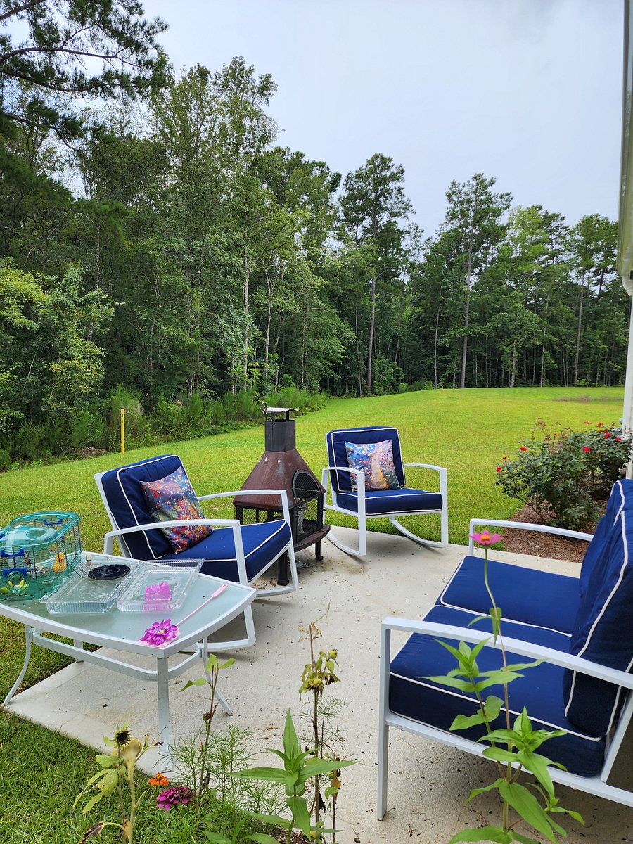Back yard view Bring your golf clubs, practice net, and biodegradable golf ball,, fishing pole, Bike, yoga mat , camera and walking shoes. There s life after work enjoy it 