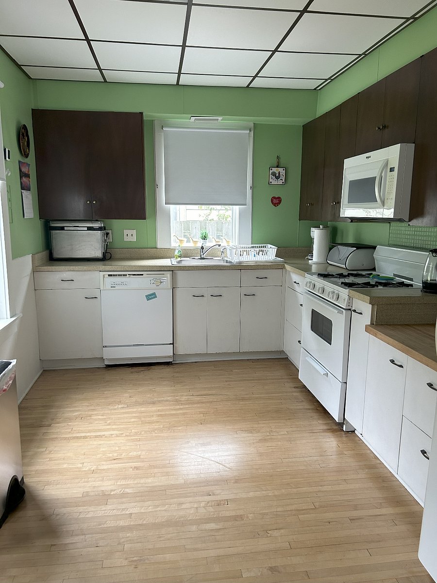 Kitchen with new dishwasher! Newer Microwave, Stove/ Oven and Fridge. Also has a Ninja toaster oven, blender, coffee pot, French Press, pressure cooker, crockpot and everything you need in the kitchen (dishes, pots, linens, cleaning products)