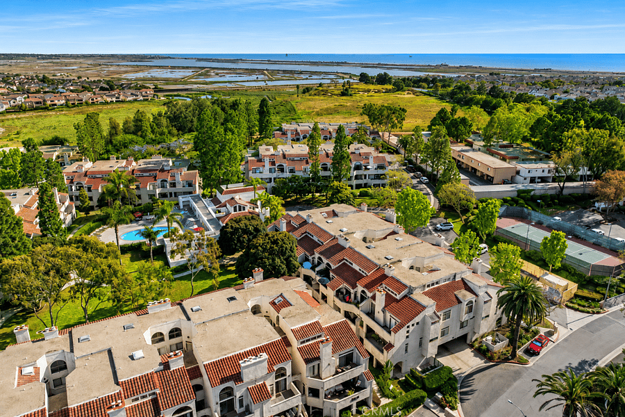 Full condo gated community with views onto the Bolsa Chica Wetlands and Sunset/Huntington Beach 