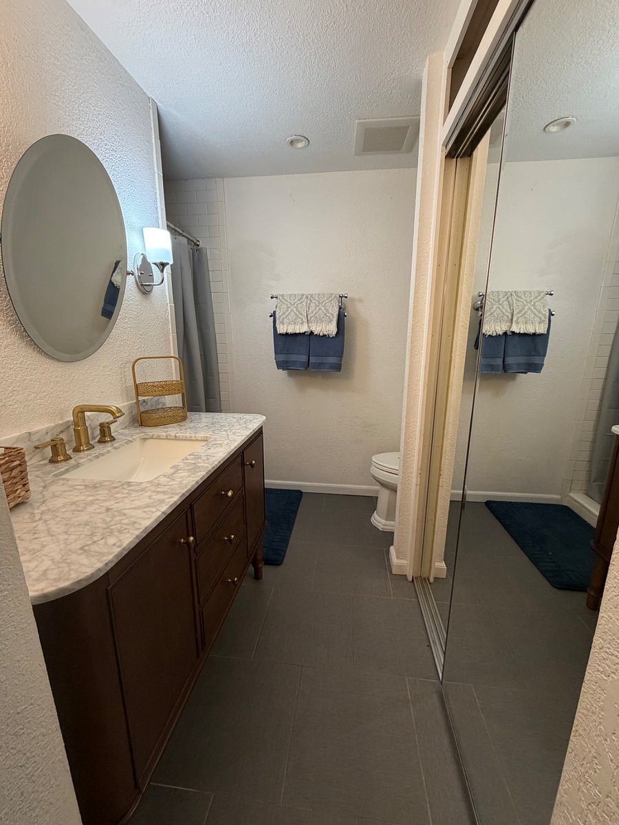 Master bathroom with shower and closet