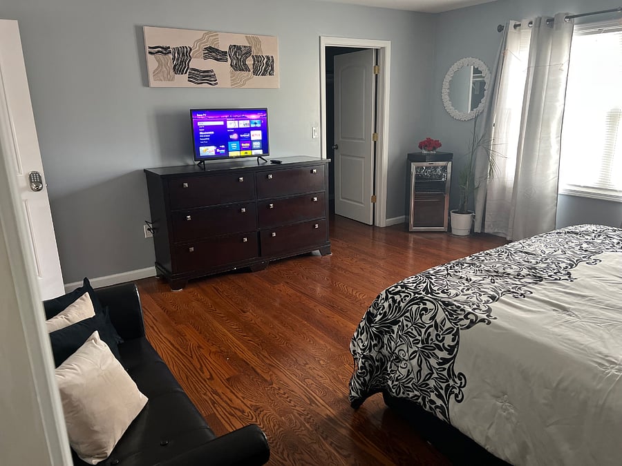 Private Master Bedroom with en-suite private bath with soaker jacuzzi tub and walk-in closet!
