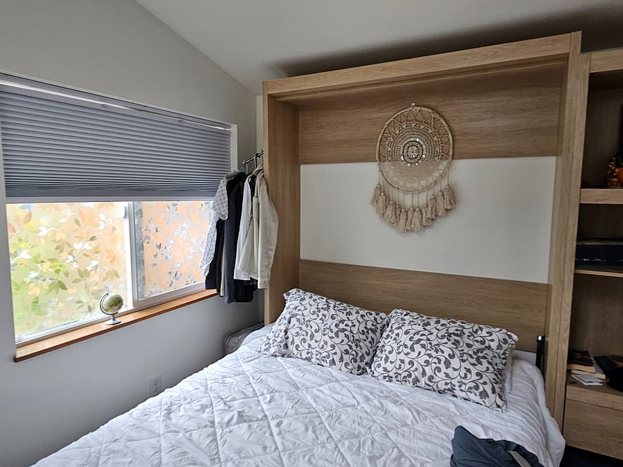 Murphy bed folds up for added floor space.