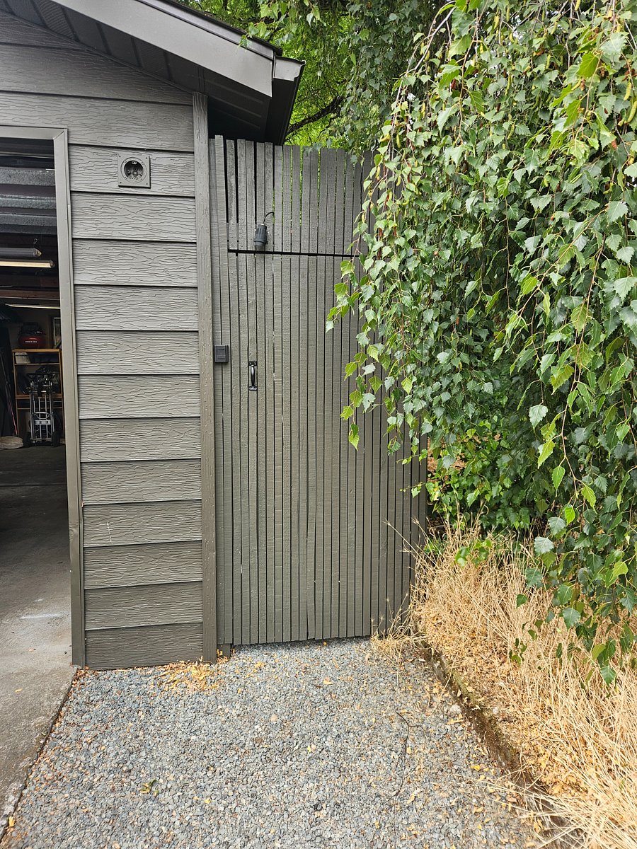 Gated entry off alley.