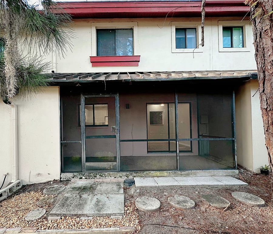 Back view of the townhouse; screen porch