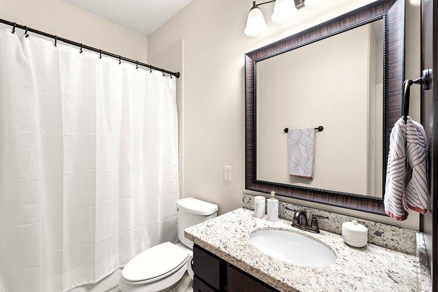 Private bathroom connected to the queen bedroom located on the third floor.