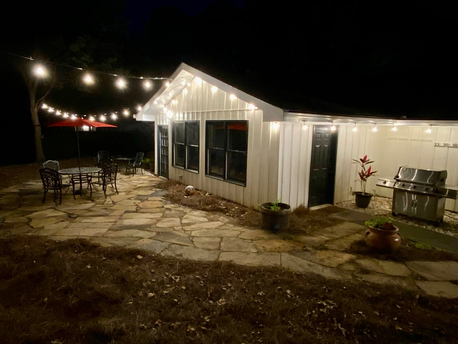 View with the Grill and The Cove's Outdoor Space with plenty of Edison Lighting!