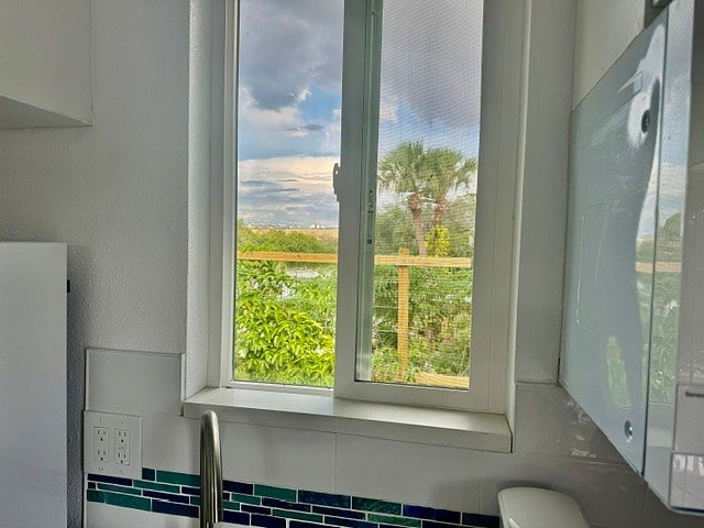 View out kitchen window. View of the water out every window