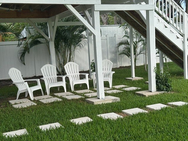 Outdoor Seating in the shade during the summer which doubles as seating around the fire-pit in the winter