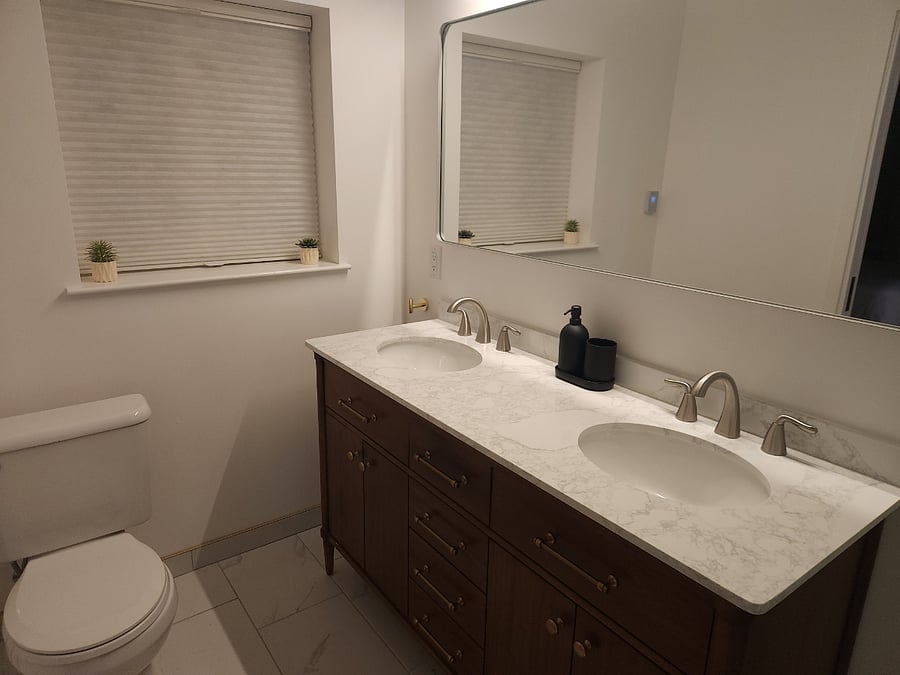Dual vanity and toilet. Soap and toothbrush holder